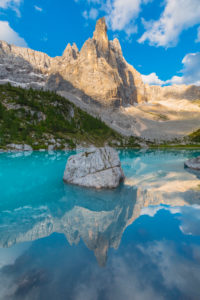 Dito di Dio (Finger of God) reflected in the turquoise water of Sorapiss lake, Dolomites, Cortina d' Ampezzo, Belluno, Veneto, Italy Dito di Dio (Finger of God) reflected in the turquoise water of Sorapiss lake, Dolomites, Cortina d' Ampezzo, Belluno, Veneto, Italy